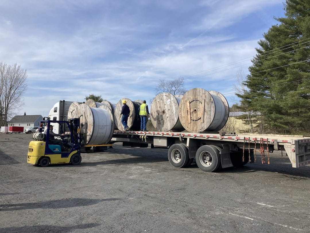 A photo of spools of fiber optic cables being delivered to CVFiber's storage location.